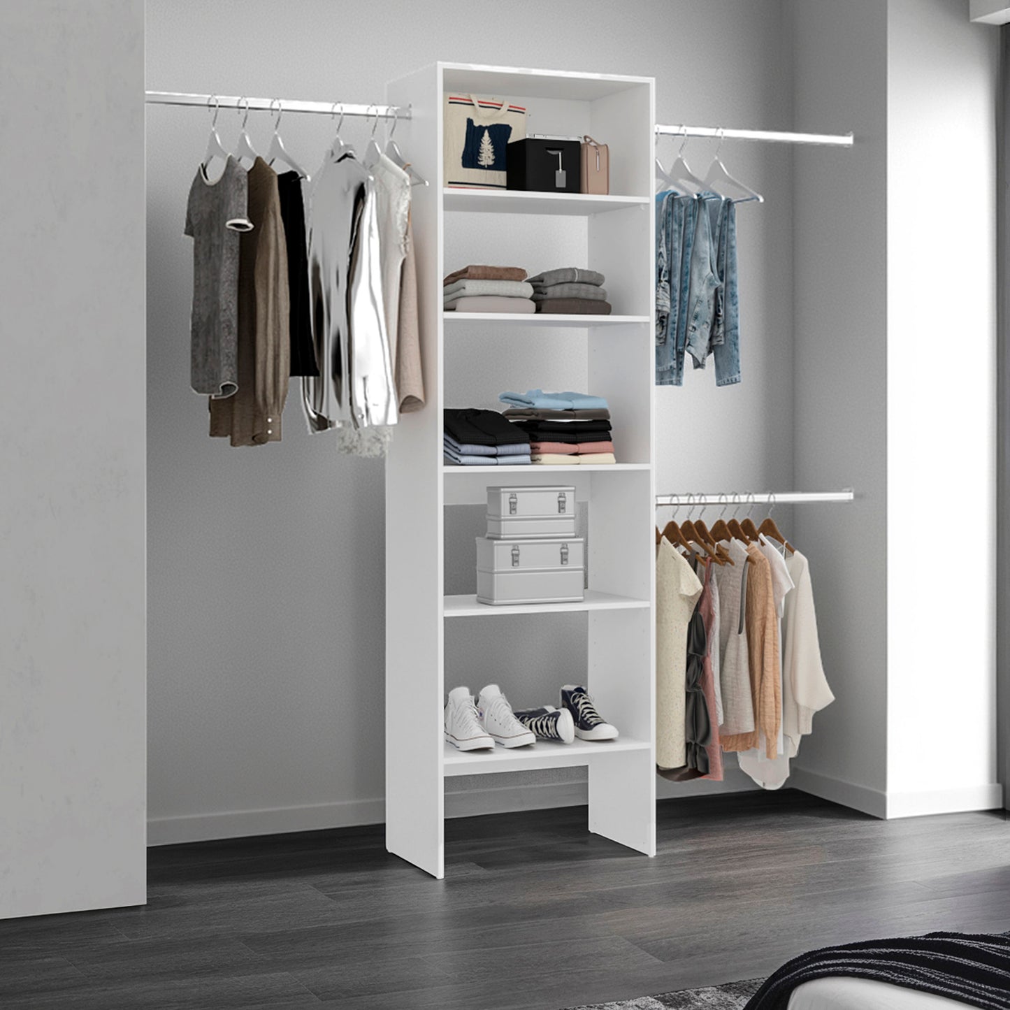 Closet with shelves and clothes hanging on a rack against a gray wall.