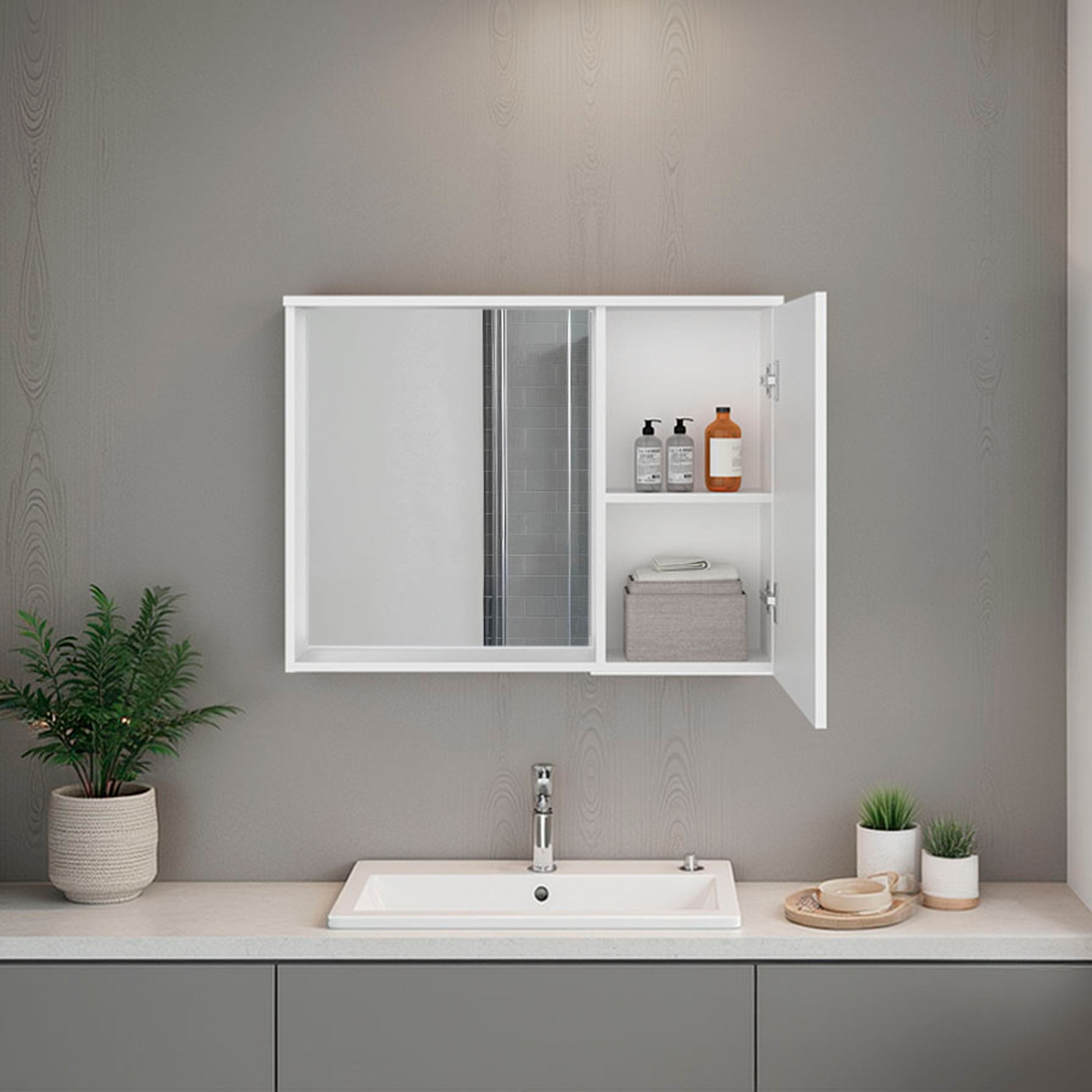 Bathroom with a white cabinet, sink, and decorative elements on a gray wall.