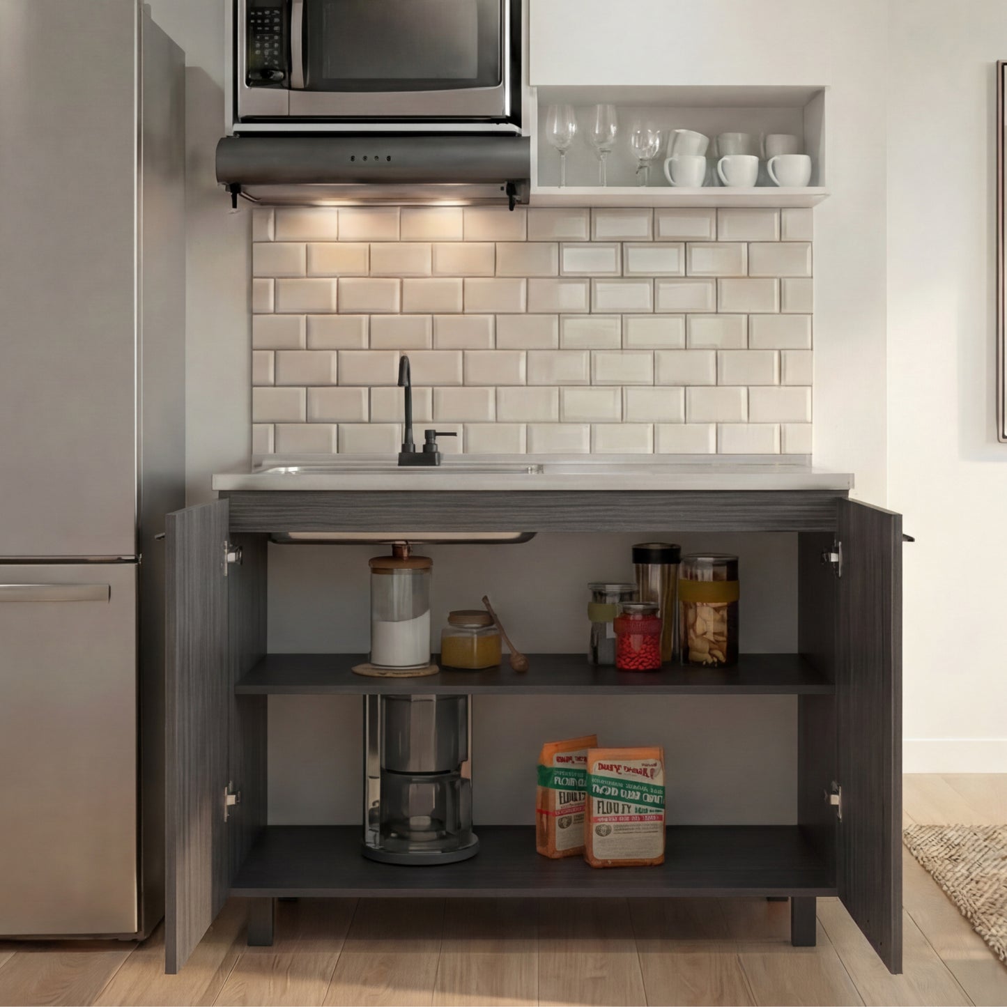 Napoles Utility Sink with Faucet Inclued and Integrated Steel Counter top, Freestanding cabinet with two doors, Metal Handles and Two interior shelves.