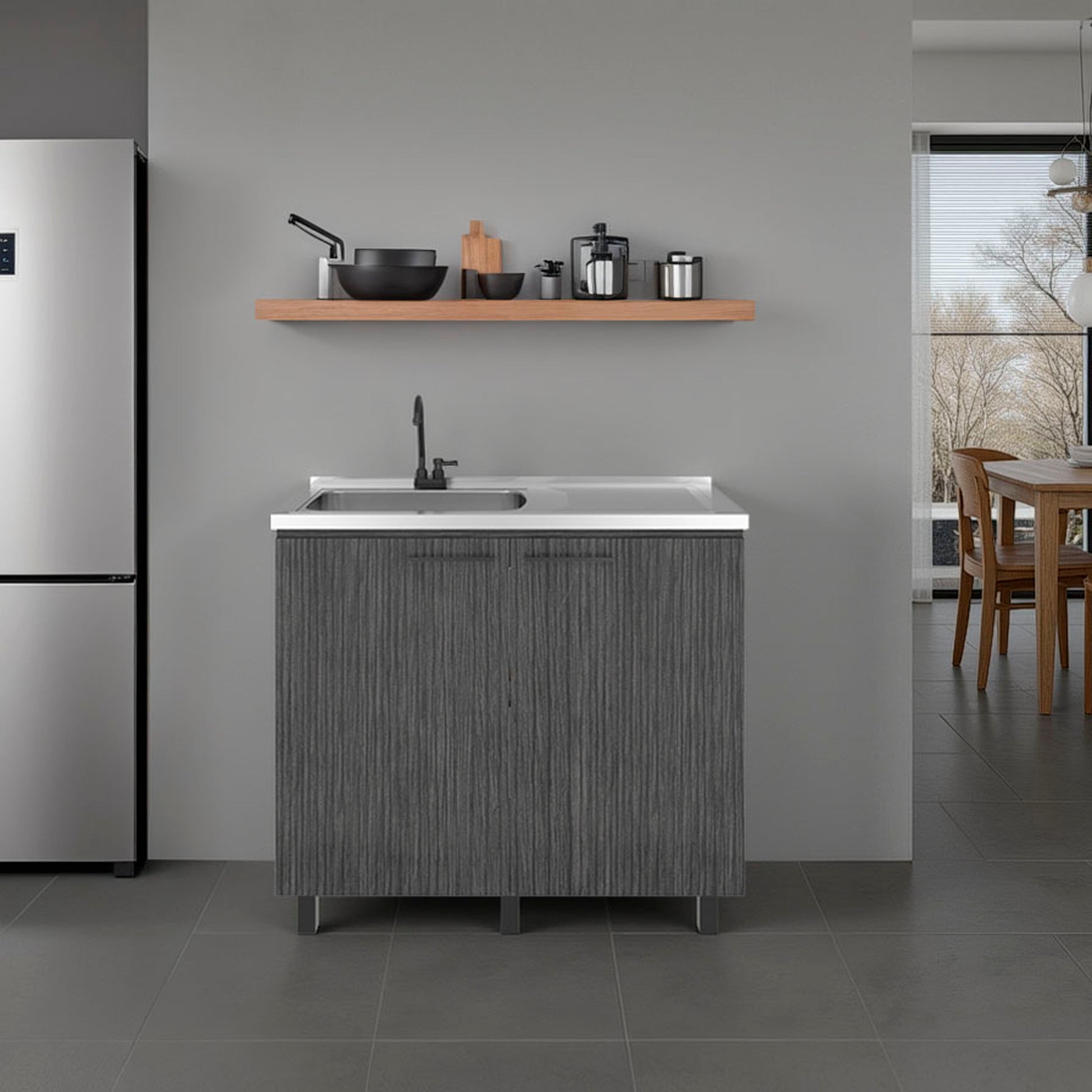 Modern kitchen setup with a refrigerator, sink unit, and wooden shelf.